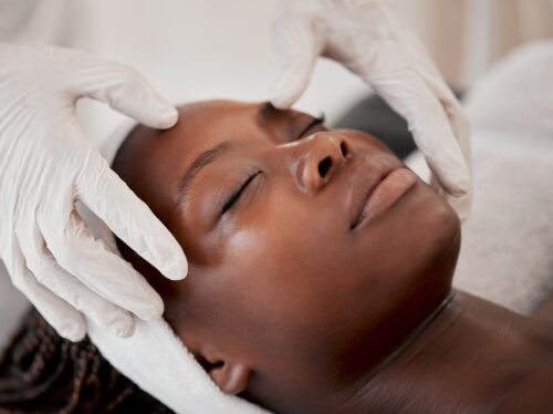woman during wellness consultation and facial