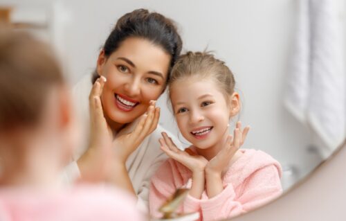mother and daughter enjoy skincare routine with weight loss peptides